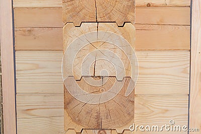 Fragment of a construction built of glued pine timber Stock Photo