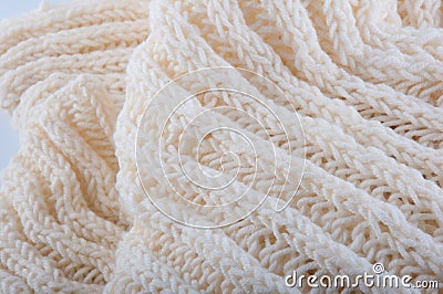 Fragment of creamy handmade wool knitwork Stock Photo