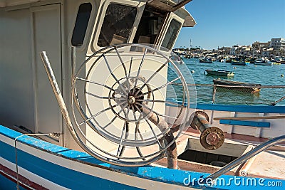 Malta, Marsaxlokk, August 2019. Nets extraction device on the bow of a fishing boat. Editorial Stock Photo