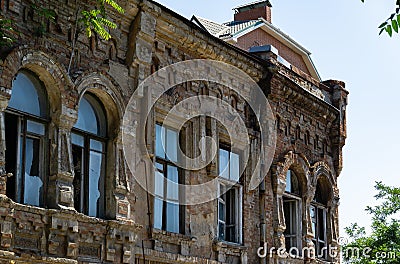 Fragment of facade burnt house, monument of architecture on the corner of Cathedral Lane and Donskaya Street in Rostov-on-Don Stock Photo