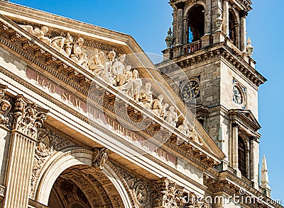 Fragment of facade of Saint Stephen Basilica, bell tower with a clock. Stock Photo