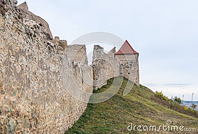 Fragment of the fortress wall of the Rupea Citadel built in the 14th century on the road between Sighisoara and Brasov in Romania Stock Photo