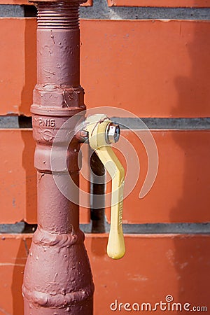 Fragment of a gas pipe with the crane Stock Photo