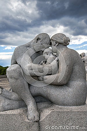 Fragment of the granite family sculpture Editorial Stock Photo