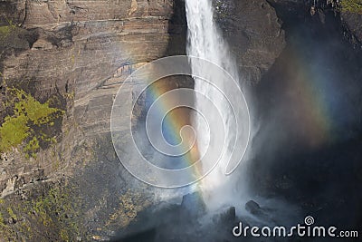 Fragment of Haifoss waterfall with rainbow Stock Photo