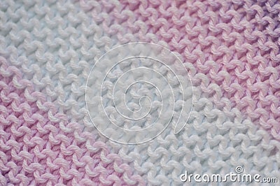 Fragment of handmade seamless knitted patterns in mixed pastel colors Stock Photo