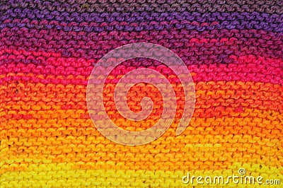 Fragment of handmade seamless knitted patterns in rainbow sunset colors mix Stock Photo