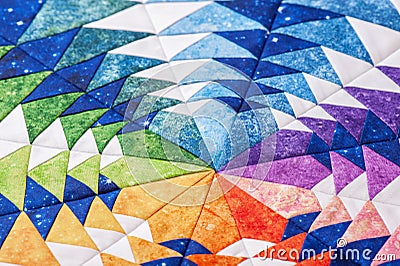 Fragment of hexagon patchwork block like kaleidoscope, detail of quilt, colors of rainbow Stock Photo