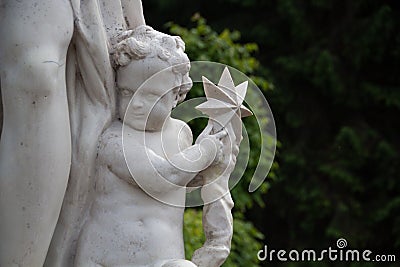 Fragment marble sculpture Air in the lower park of Peterhof. Editorial Stock Photo