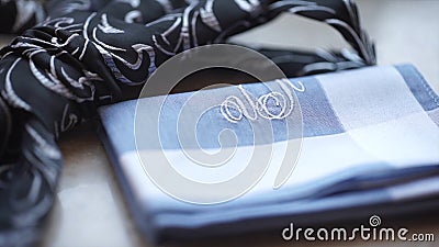 Fragment of a men`s shirt with a tie on floor. men`s tie and handkerchief. Men`s suits dress accessories pocket towel Stock Photo