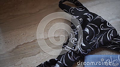 Fragment of a men`s shirt with a tie on floor. men`s tie and handkerchief. Men`s suits dress accessories pocket towel Stock Photo