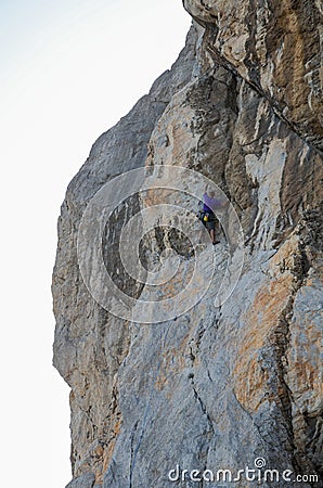 Rock climber climbs the cliff, close-up view Editorial Stock Photo