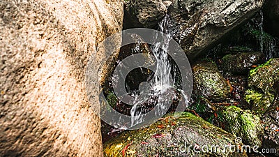 Fragment of mountain waterfall in Armenia side view Stock Photo