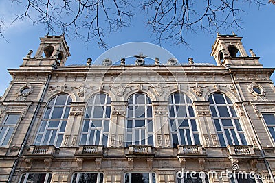 Fragment of old building facade with rich decoration in Ruse, Bulgaria. The Opera is historical baroque building, built in 1902 Stock Photo