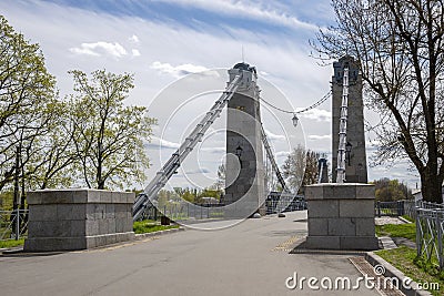 Fragment of an old suspension bridge over the Velikaya River. The city of Ostrov, Pskov region Stock Photo