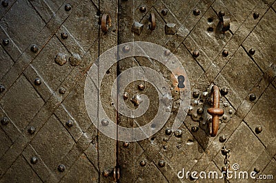 Fragment of the old wrought bronze doors Stock Photo