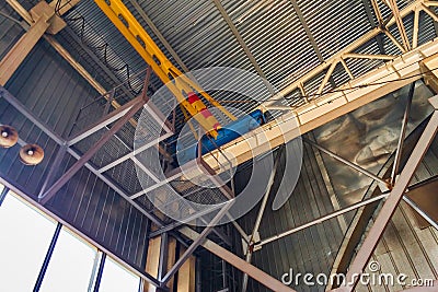 Fragment of overhead crane in the assembly workshop Stock Photo