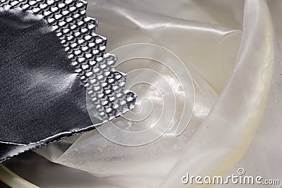 Fragment of packaging and condom. Close-up. Selective focus Stock Photo