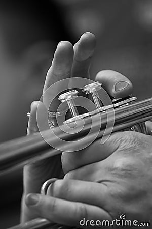 Fragment of a pipe in the hands of a musician Stock Photo