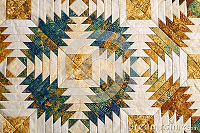 Fragment of quilt stitched from pineapple pattern blocks, traditional patchwork Stock Photo