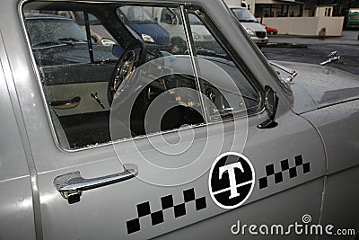 Fragment of retro old car Volga GAZ - 21 taxi cab / USSR 1960 .. Editorial Stock Photo