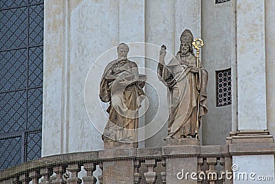 Fragment with sculptures on the facade of the Church of St. Nicholas in Prague Editorial Stock Photo