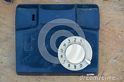 Fragment of stationary phone on a wood background Stock Photo