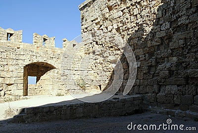 Fragment strongly weathered medieval castle wall on the island of Rhodes in Greece Stock Photo