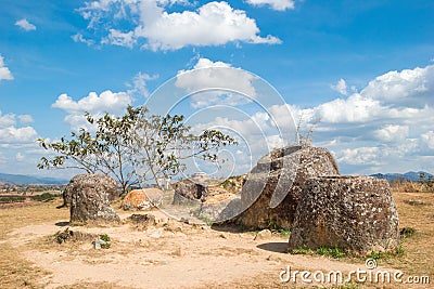 Fragment of unique archaeological site which was destroyed from exploded cluster bombs - Plain of Jars. Stock Photo