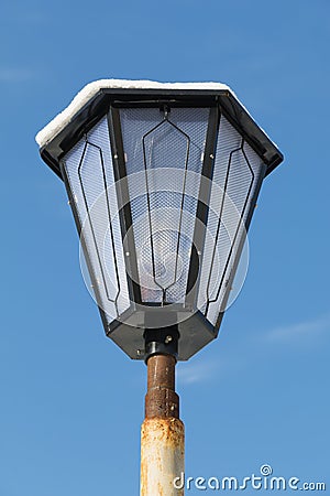 Fragment of the upper part of the street lamp Stock Photo