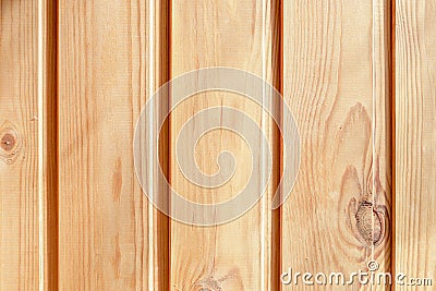 Fragment of the wall, sheathed with vertical planks. Natural wall decoration material. Wood texture or wood background Stock Photo