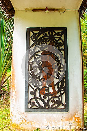 Fragment wood carving. The main entrance of the Kuching to Sarawak Culture village. Malaysia Stock Photo