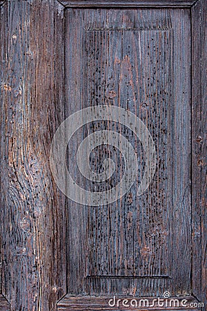 Fragment of a wood door affected by woodworm Stock Photo