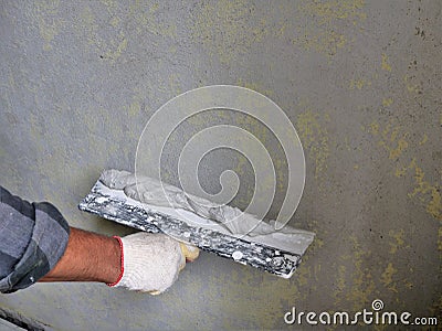 fragment of the work of the plasterer Stock Photo