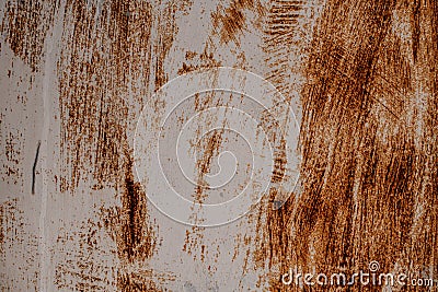 fragment of worn shabby rusty iron plate with peeled off paint and scratches. Stock Photo