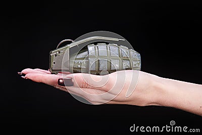 fragmentation grenade in girl hand Stock Photo