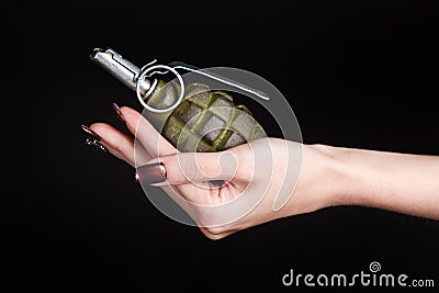 fragmentation grenade in girl hand Stock Photo