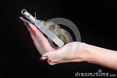 fragmentation grenade in girl hand Stock Photo