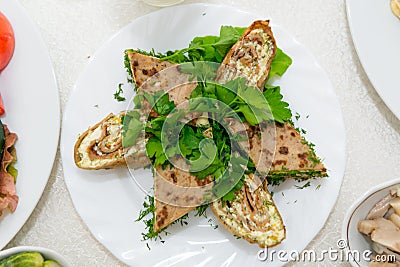 A fragrant liver cake, cut into pieces close-up. Stock Photo