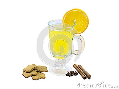 Fragrant spicy drink grog yellow for warming in the winter evening slice orange cinnamon ginger biscuits and star anise Stock Photo