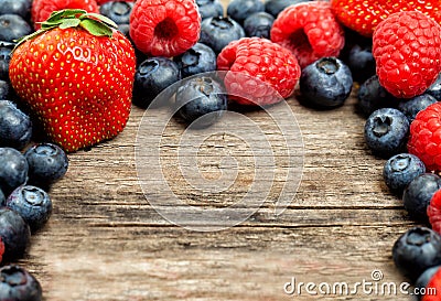 Frame of assorted summer berries. Strawberry Stock Photo