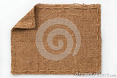 Frame of burlap with curled edges, lies on a white background Stock Photo