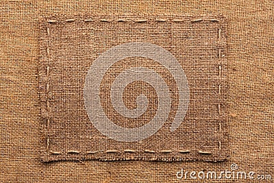 Frame of burlap, lies on a background of burlap Stock Photo