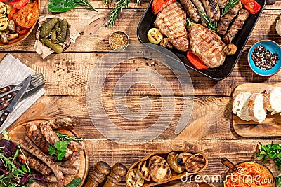 Frame of different food grill on the wooden table Stock Photo