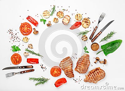 Frame of different food grilled on a white background Stock Photo