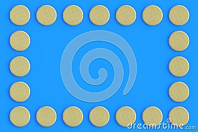 Frame of golden metal heads of nails on blue background Stock Photo