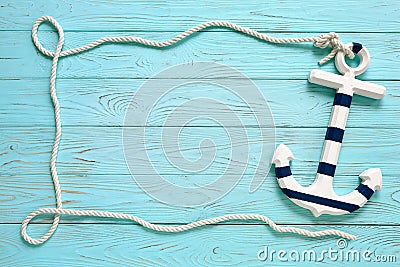 Frame made of rope with an anchor. Summer time sea vacation concept Stock Photo