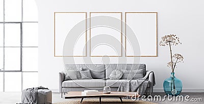 Frame mockup in interior living room design. Three vertical frames on white background with big window. Stock Photo