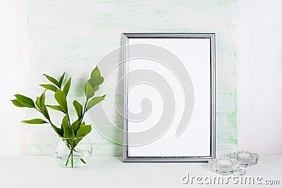 Frame mockup on light green background Stock Photo