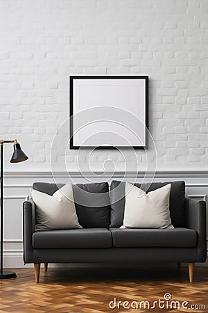 Frame mockup poster on white brick wall above dark gray leather couch, front view. Minimalist interior with picture and decor. Stock Photo